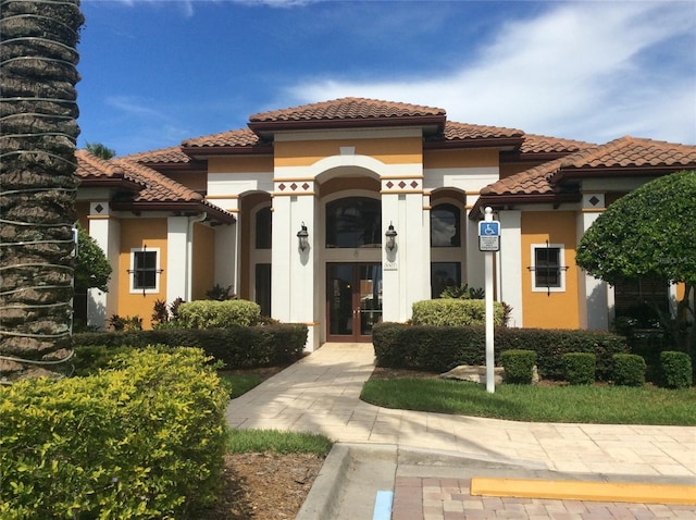 8397 38th Street Cir E Unit 305, Sarasota, FL 34243 - mediterranean / spanish-style home with stucco siding and a tiled roof