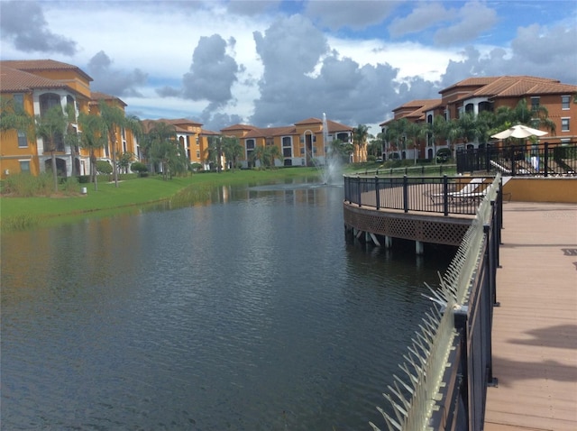 8397 38th Street Cir E Unit 305, Sarasota, FL 34243 - dock with a water view and a residential view