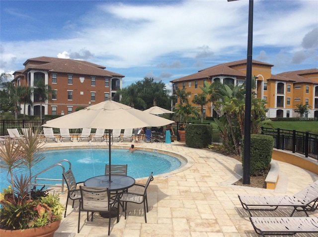 8397 38th Street Cir E Unit 305, Sarasota, FL 34243 - community pool with a patio area