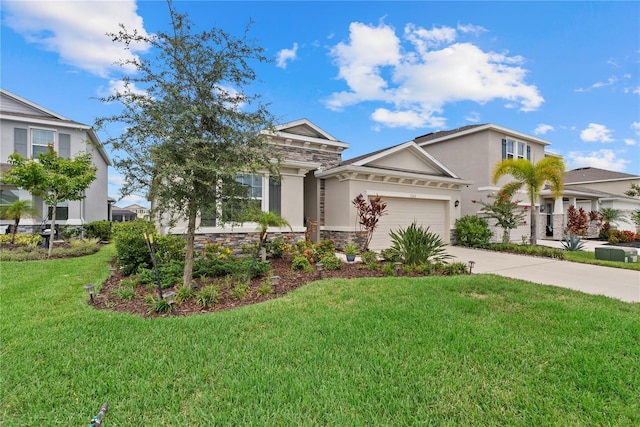 5313 Halewood Ct, Lakewood Ranch, FL 34211 - view of front facade featuring stone siding, a garage, concrete driveway, a front yard, and stucco siding