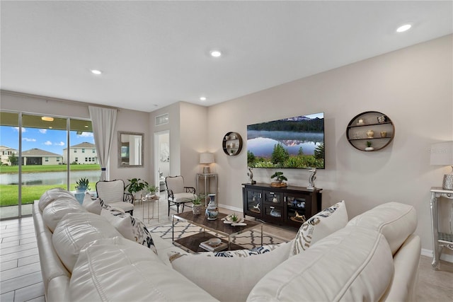 5313 Halewood Ct, Lakewood Ranch, FL 34211 - living area with recessed lighting and a water view