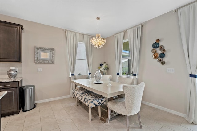 5313 Halewood Ct, Lakewood Ranch, FL 34211 - dining room featuring a chandelier and light tile patterned flooring
