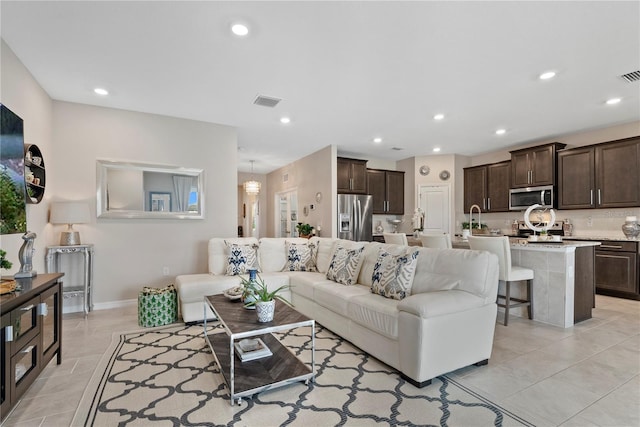 5313 Halewood Ct, Lakewood Ranch, FL 34211 - living area featuring recessed lighting and light tile patterned floors