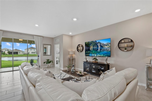 5313 Halewood Ct, Lakewood Ranch, FL 34211 - living room with a water view and recessed lighting