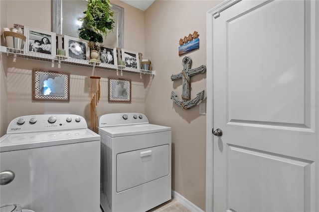 5313 Halewood Ct, Lakewood Ranch, FL 34211 - laundry room with washer and dryer and baseboards