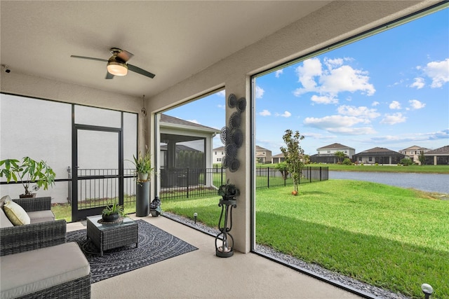 5313 Halewood Ct, Lakewood Ranch, FL 34211 - sunroom with a water view, a ceiling fan, and a residential view
