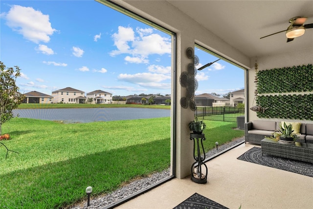 5313 Halewood Ct, Lakewood Ranch, FL 34211 - sunroom featuring a ceiling fan, a residential view, and a water view