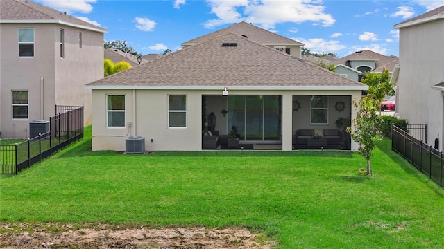 5313 Halewood Ct, Lakewood Ranch, FL 34211 - back of property with roof with shingles, a fenced backyard, a sunroom, and stucco siding