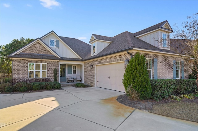 636 Meadow Lake Dr, Freeport, FL 32439 - view of front facade featuring board and batten siding, driveway, and brick siding
