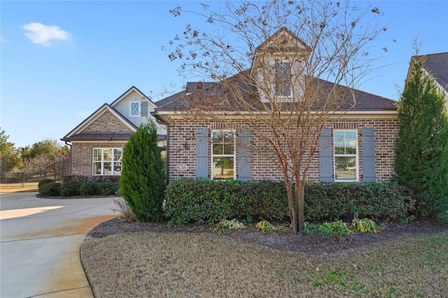 636 Meadow Lake Dr, Freeport, FL 32439 - view of front of house featuring brick siding