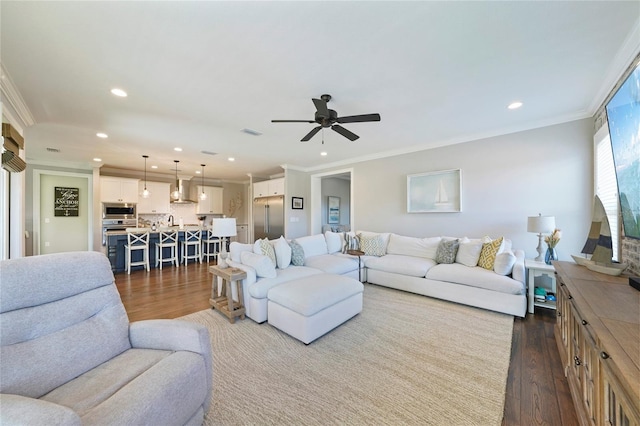 636 Meadow Lake Dr, Freeport, FL 32439 - living area with dark wood-type flooring, recessed lighting, crown molding, and a ceiling fan