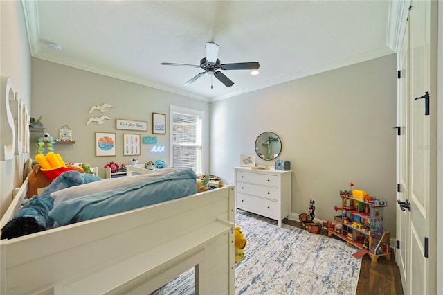 636 Meadow Lake Dr, Freeport, FL 32439 - bedroom featuring crown molding, wood finished floors, and a ceiling fan
