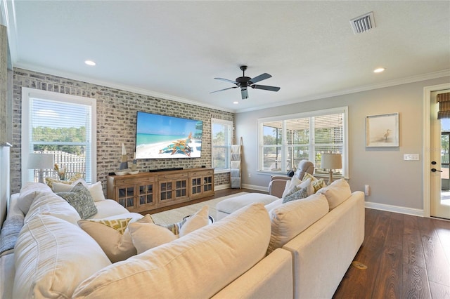 636 Meadow Lake Dr, Freeport, FL 32439 - living area with crown molding, a ceiling fan, dark wood-style floors, recessed lighting, and brick wall