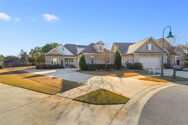 636 Meadow Lake Dr, Freeport, FL 32439 - view of front of house featuring concrete driveway, brick siding, and board and batten siding