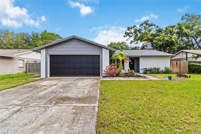 616 Bryan Terrace Dr, Brandon, FL 33511 - view of front facade with a garage, driveway, and stucco siding