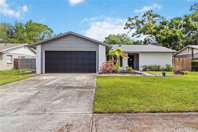 616 Bryan Terrace Dr, Brandon, FL 33511 - view of front of property featuring driveway, an attached garage, and stucco siding