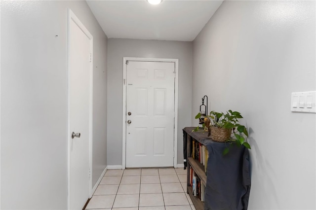 616 Bryan Terrace Dr, Brandon, FL 33511 - doorway to outside featuring light tile patterned flooring and baseboards