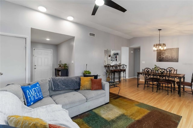 616 Bryan Terrace Dr, Brandon, FL 33511 - living room featuring wood finished floors, a ceiling fan, lofted ceiling, a chandelier, and recessed lighting