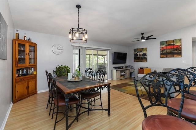 616 Bryan Terrace Dr, Brandon, FL 33511 - dining space with light wood-style flooring, ceiling fan, and a chandelier