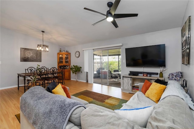 616 Bryan Terrace Dr, Brandon, FL 33511 - living room with a chandelier, light wood finished floors, and ceiling fan
