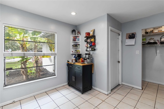 616 Bryan Terrace Dr, Brandon, FL 33511 - bar area with healthy amount of natural light, light tile patterned flooring, and recessed lighting