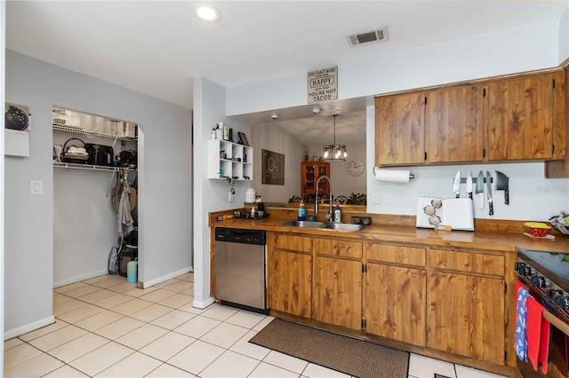 616 Bryan Terrace Dr, Brandon, FL 33511 - kitchen featuring stainless steel appliances, brown cabinets, light tile patterned floors, recessed lighting, and pendant lighting