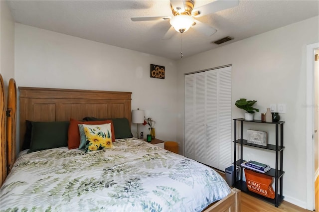 616 Bryan Terrace Dr, Brandon, FL 33511 - bedroom featuring a closet, light wood-style flooring, and ceiling fan
