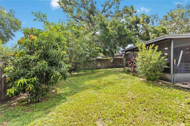 616 Bryan Terrace Dr, Brandon, FL 33511 - fenced backyard with a sunroom