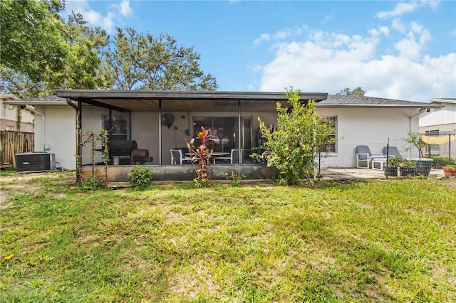 616 Bryan Terrace Dr, Brandon, FL 33511 - rear view of house featuring a sunroom and stucco siding