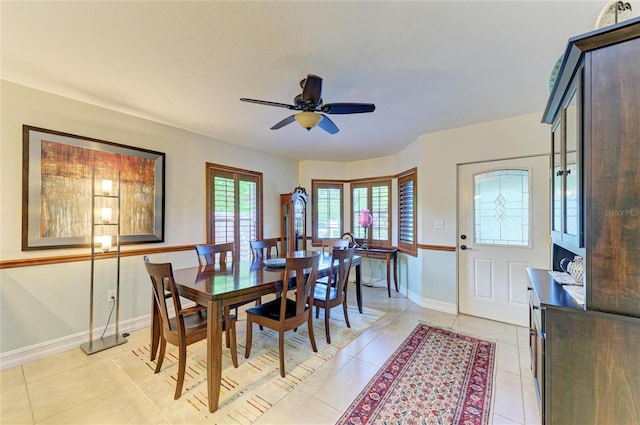 133 Tucker Ave, Sarasota, FL 34232 - dining area with a ceiling fan and light tile patterned flooring