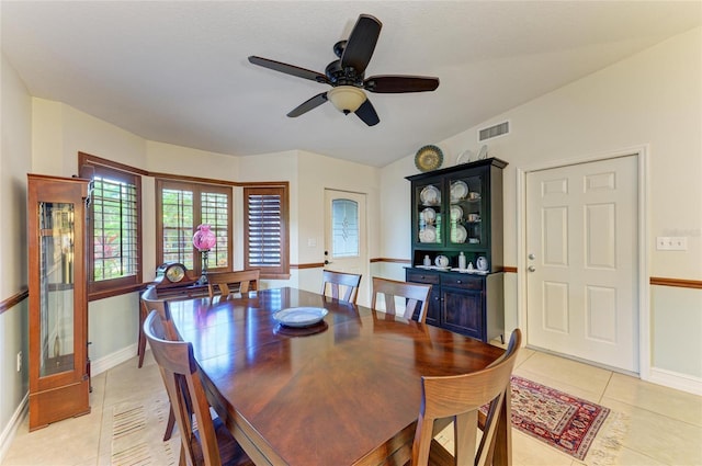133 Tucker Ave, Sarasota, FL 34232 - dining area with light tile patterned floors and a ceiling fan