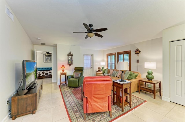 133 Tucker Ave, Sarasota, FL 34232 - living area featuring a ceiling fan and light tile patterned floors