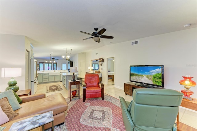 133 Tucker Ave, Sarasota, FL 34232 - living area with ceiling fan and light tile patterned flooring