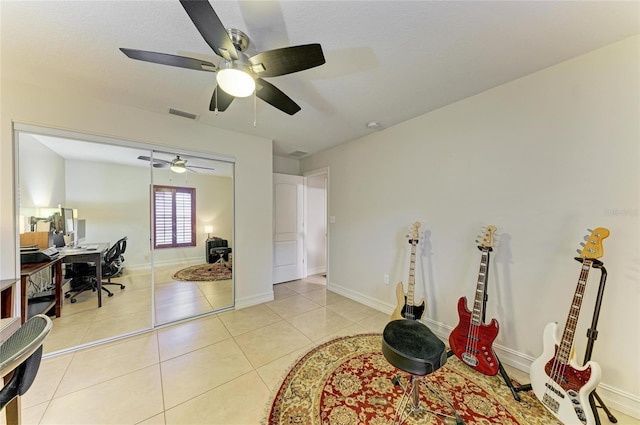 133 Tucker Ave, Sarasota, FL 34232 - tiled home office with a ceiling fan and baseboards