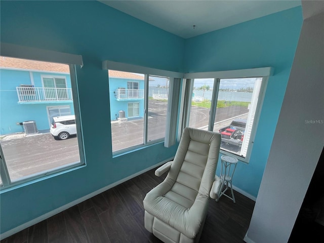 611 Gulf Dr N Unit B24, Bradenton Beach, FL 34217 - living area featuring baseboards and wood finished floors