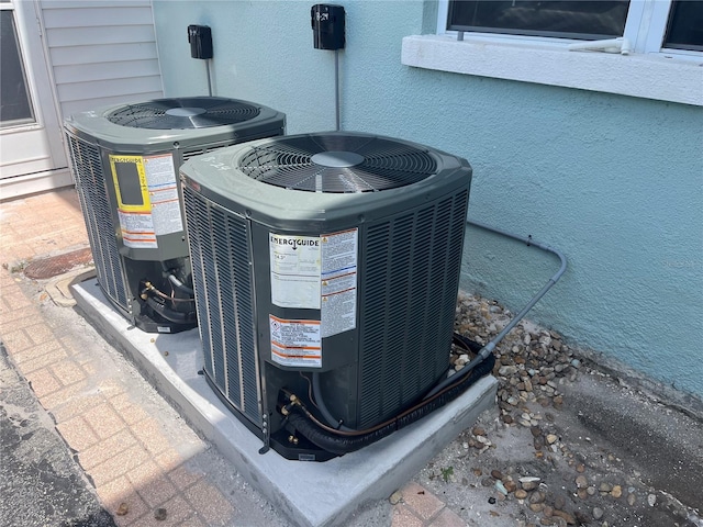 611 Gulf Dr N Unit B24, Bradenton Beach, FL 34217 - exterior view of a central AC unit and pet washing area