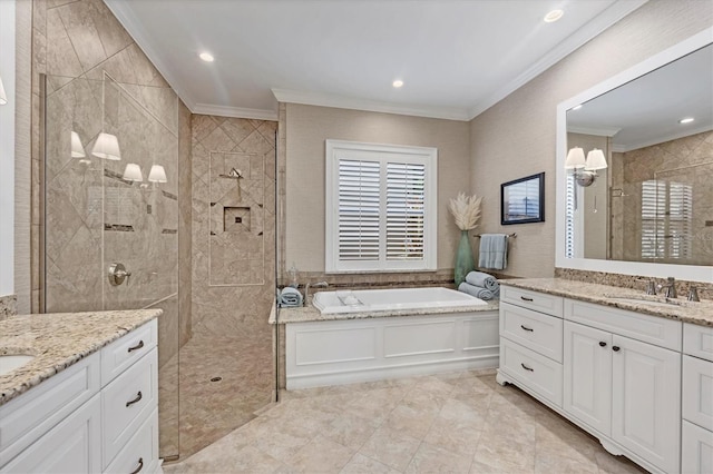 14611 Leopard Creek Pl, Lakewood Ranch, FL 34202 - bathroom with ornamental molding, two vanities, a garden tub, tiled shower, and recessed lighting