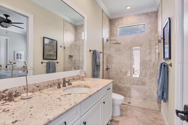 14611 Leopard Creek Pl, Lakewood Ranch, FL 34202 - bathroom with ornamental molding, vanity, tiled shower, ceiling fan, and tile patterned flooring