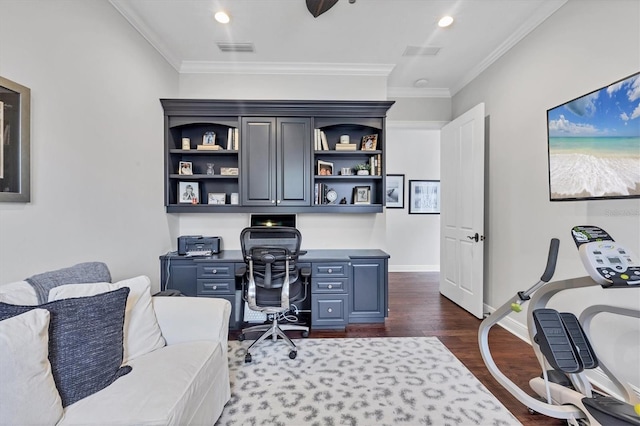 14611 Leopard Creek Pl, Lakewood Ranch, FL 34202 - office space with dark wood finished floors, crown molding, built in study area, and recessed lighting