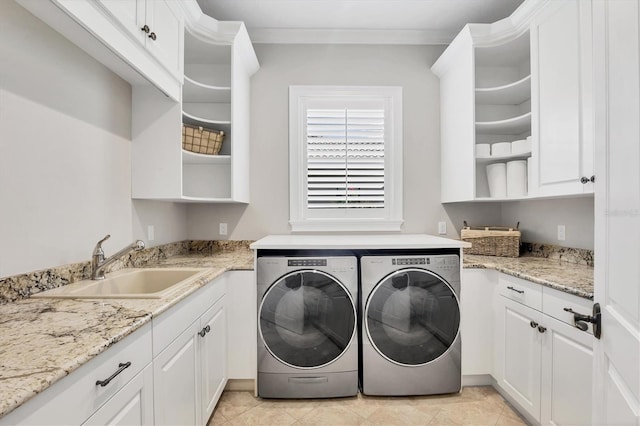 14611 Leopard Creek Pl, Lakewood Ranch, FL 34202 - laundry area with washer and clothes dryer and cabinet space