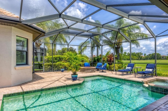 14611 Leopard Creek Pl, Lakewood Ranch, FL 34202 - view of swimming pool with a pool with connected hot tub, a patio, and a lanai