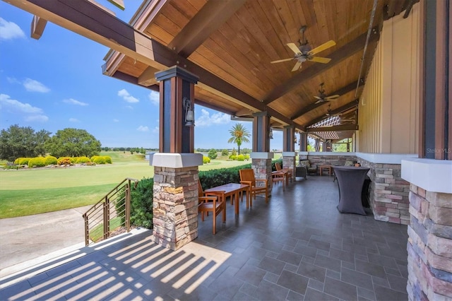 14611 Leopard Creek Pl, Lakewood Ranch, FL 34202 - view of patio / terrace with ceiling fan and golf course view
