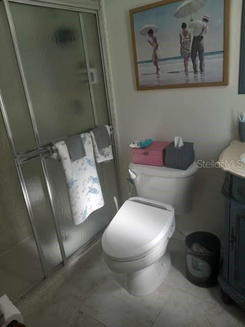 1002 Oakleaf Blvd, Bradenton, FL 34208 - full bath featuring a shower stall and vanity