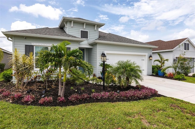 4316 Rustling Pines Ter, Parrish, FL 34219 - view of front of property featuring an attached garage, concrete driveway, a shingled roof, and a front lawn
