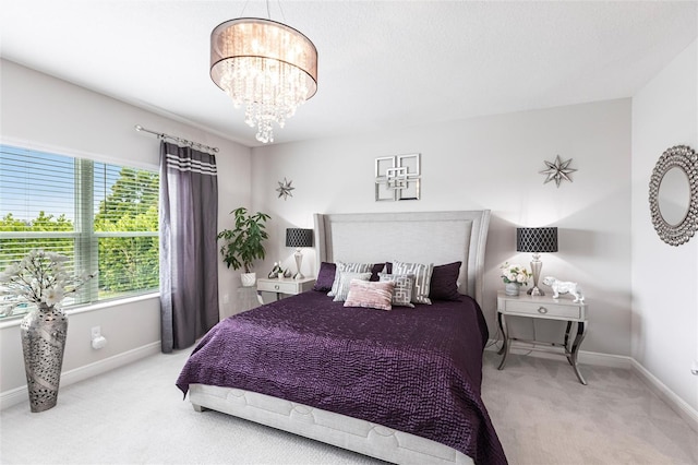 4316 Rustling Pines Ter, Parrish, FL 34219 - bedroom with carpet flooring and a chandelier