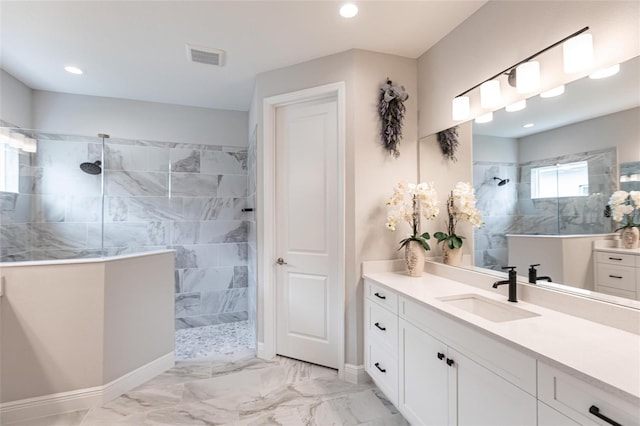 4316 Rustling Pines Ter, Parrish, FL 34219 - bathroom with a walk in shower, vanity, marble finish flooring, and recessed lighting