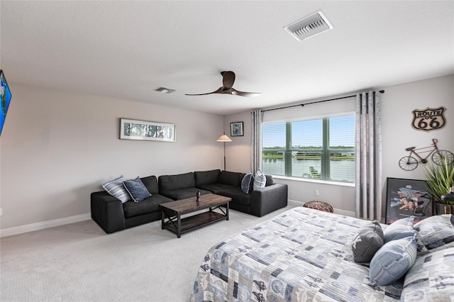 4316 Rustling Pines Ter, Parrish, FL 34219 - bedroom with light carpet and ceiling fan