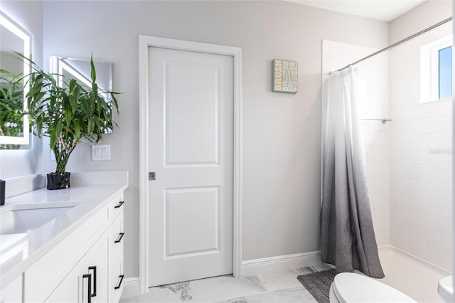 4316 Rustling Pines Ter, Parrish, FL 34219 - bathroom with vanity, a tile shower, and marble look tiles