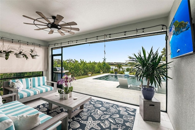 4316 Rustling Pines Ter, Parrish, FL 34219 - tiled living room featuring a ceiling fan, a textured wall, and a textured ceiling