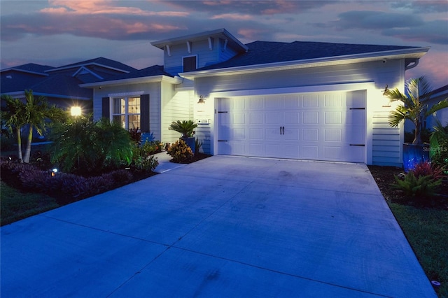 4316 Rustling Pines Ter, Parrish, FL 34219 - view of front facade with driveway and an attached garage